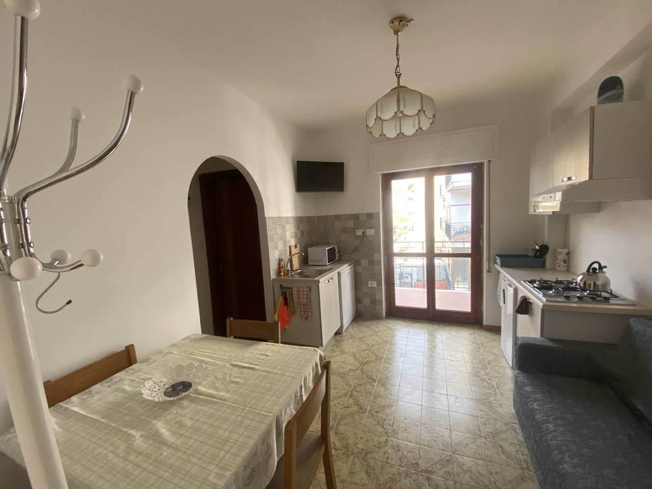 Living area and kitchen at Appartamento Nemo Scalea