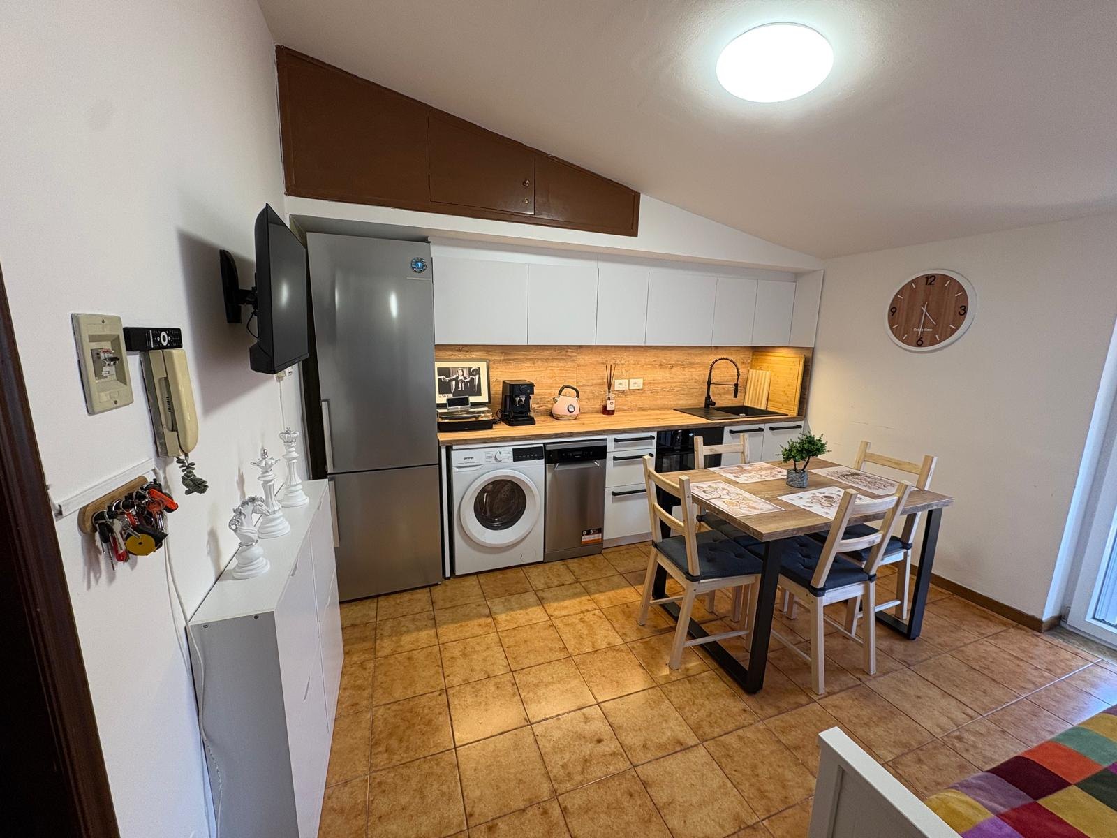 Kitchen and dining area at Procházka rájem 1 in Scalea