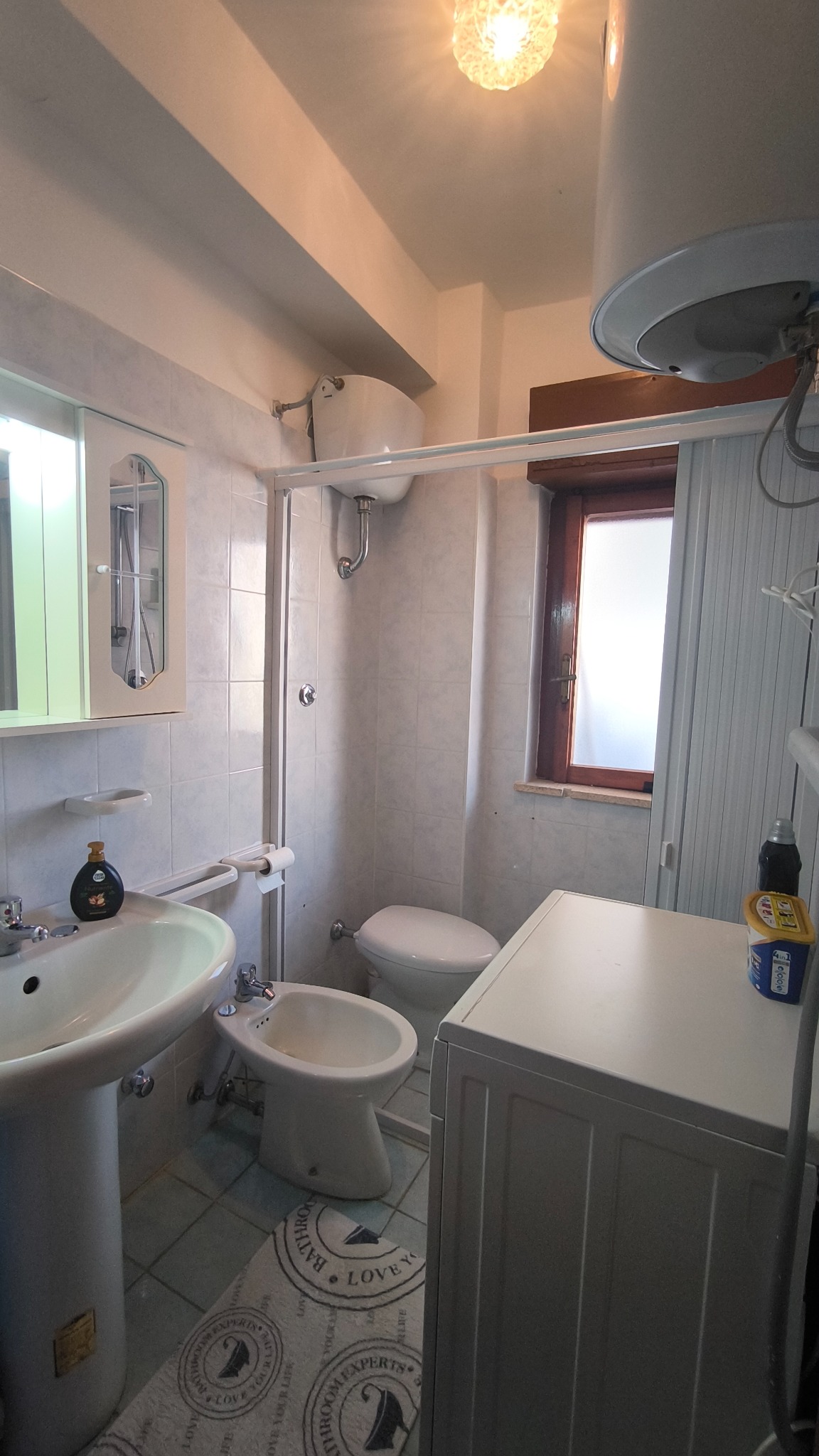 Bathroom with washing machine
